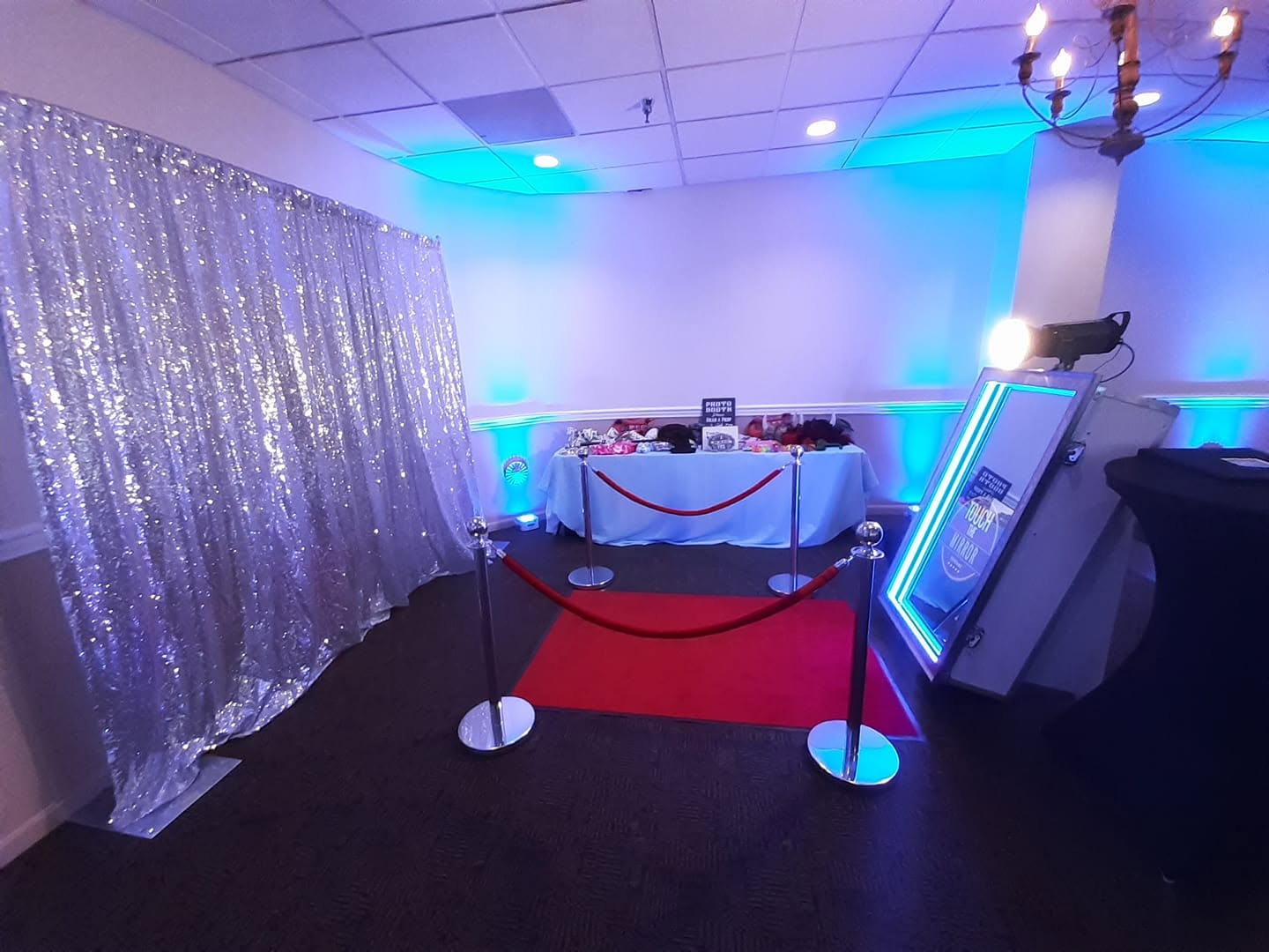 Magic mirror photo booth with blue up lighting